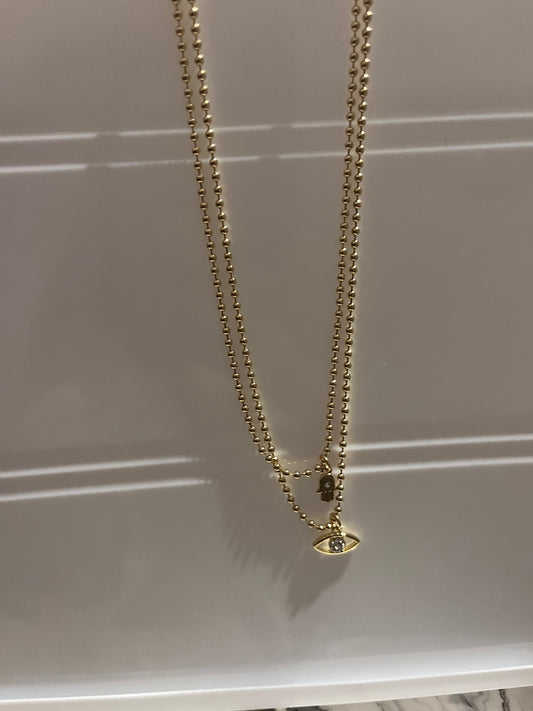 2 in 1 evil eye & hamsa hand necklaces